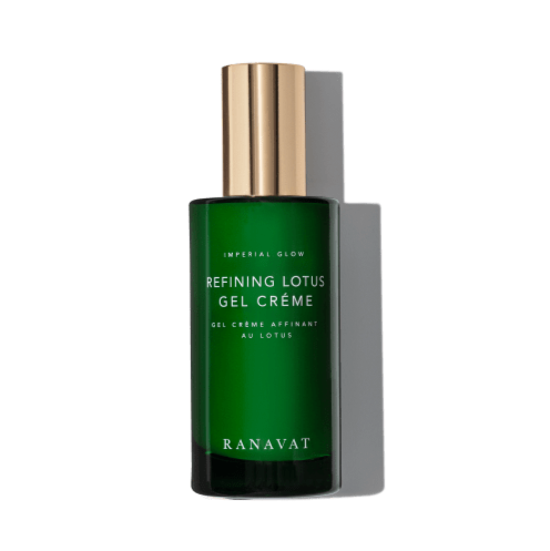Green bottle of Refining Lotus Gel Creme on a white background